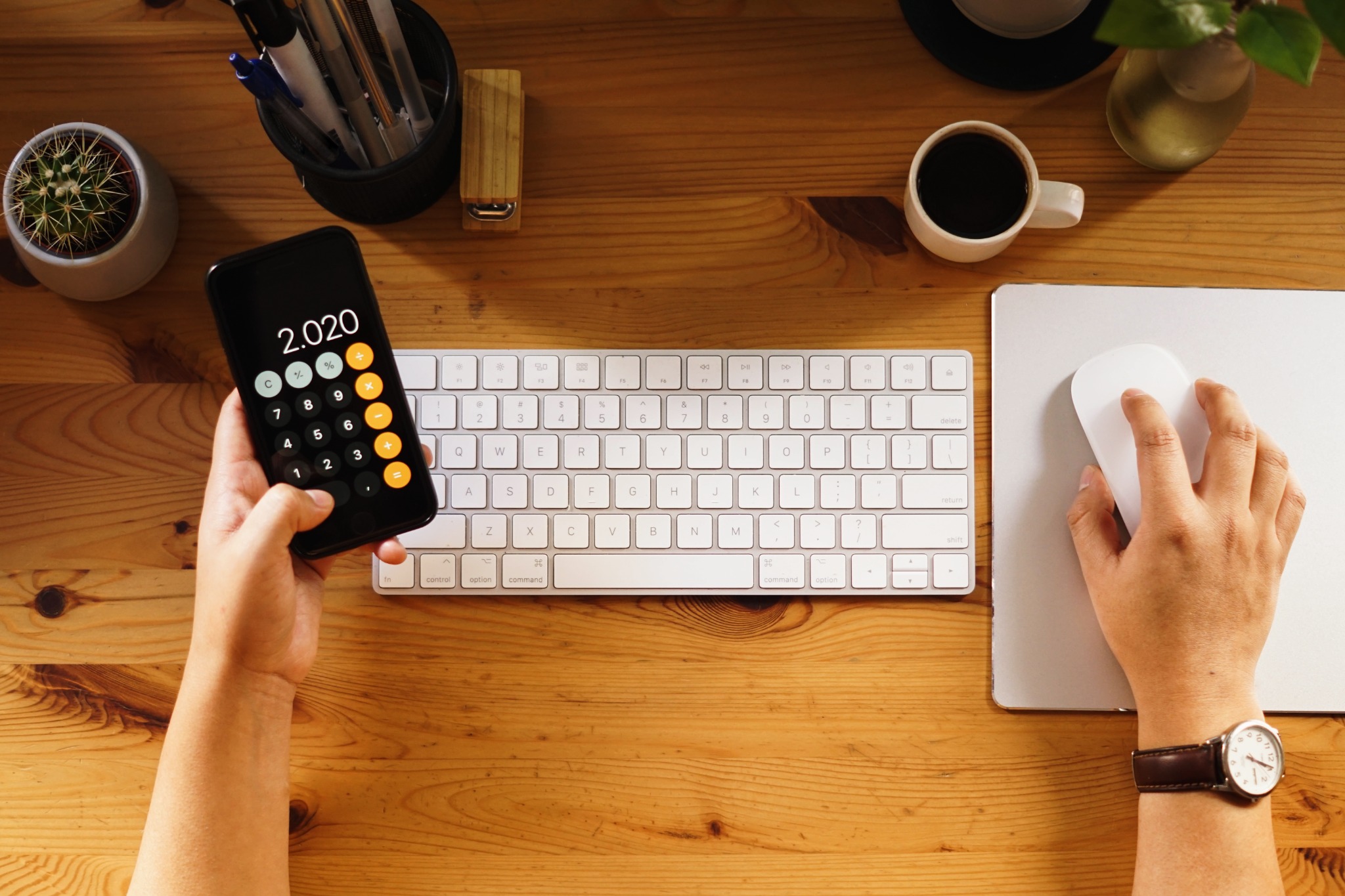 The closeup shot of working desk, where calculates the pricing